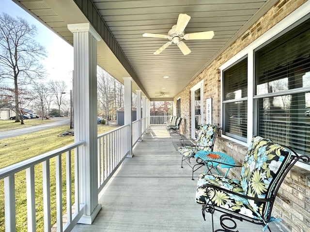 exterior space with ceiling fan and covered porch