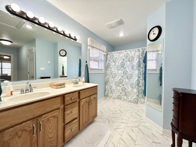 bathroom with a textured ceiling