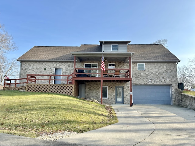 view of front of property featuring a wooden deck, a garage, and a front lawn