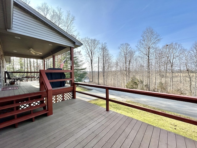 wooden terrace with ceiling fan