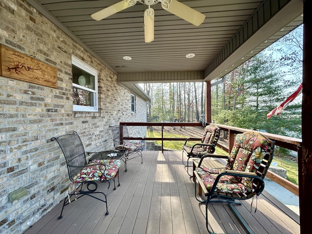 wooden terrace with ceiling fan