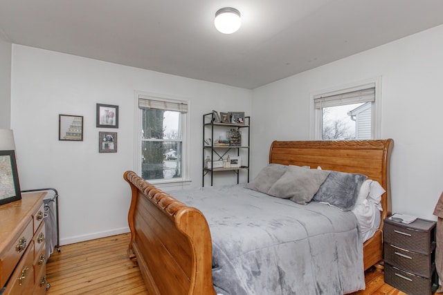 bedroom with light wood-type flooring