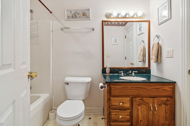 bathroom with vanity, tile patterned floors, and toilet