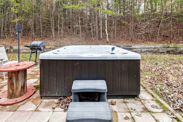 view of patio / terrace featuring a hot tub