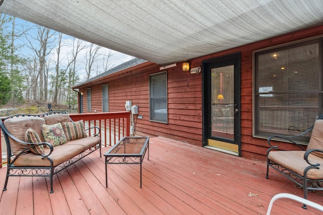 wooden deck featuring an outdoor hangout area