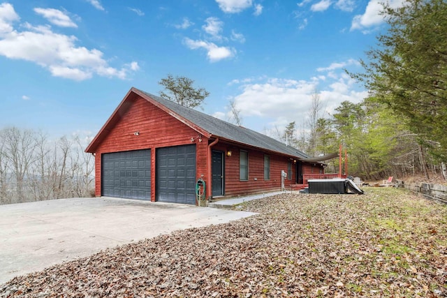 view of side of property featuring a garage