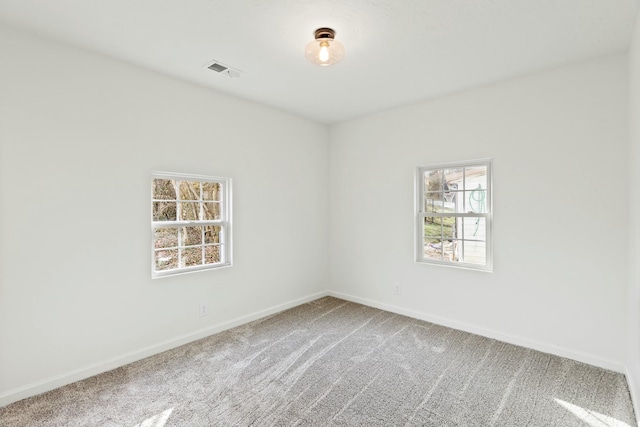 view of carpeted spare room