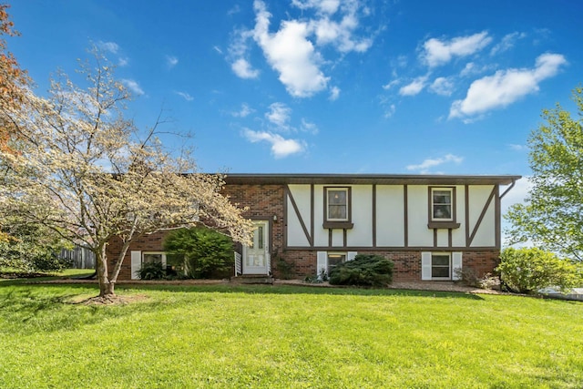 125 Thomas St, Somerset, KY 42503 - view of front facade with brick siding and a front lawn