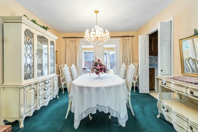 125 Thomas St, Somerset, KY 42503 - dining space with dark carpet and an inviting chandelier