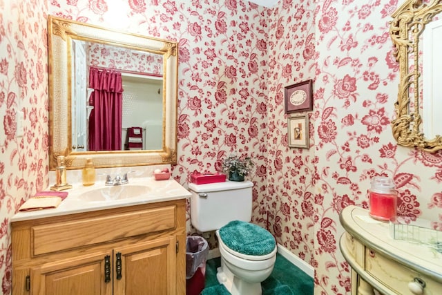 125 Thomas St, Somerset, KY 42503 - half bath with wallpapered walls, toilet, and vanity