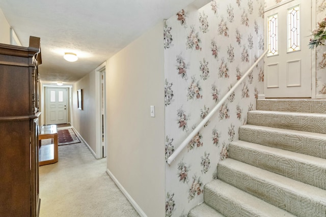 125 Thomas St, Somerset, KY 42503 - stairs with wallpapered walls, baseboards, and carpet floors