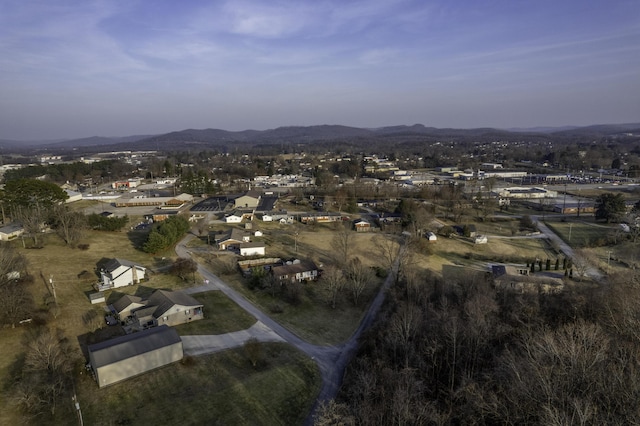 aerial view at dusk with a mountain view