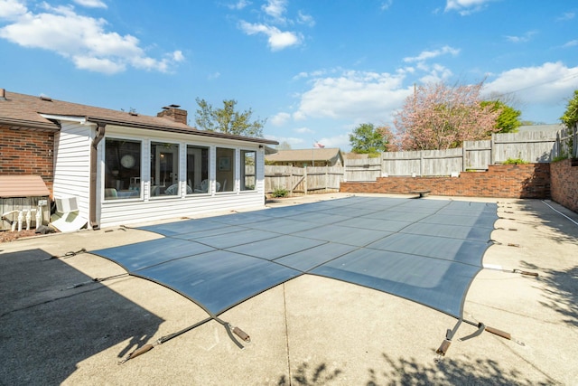 125 Thomas St, Somerset, KY 42503 - view of pool with a fenced backyard, a sunroom, a patio, and a fenced in pool
