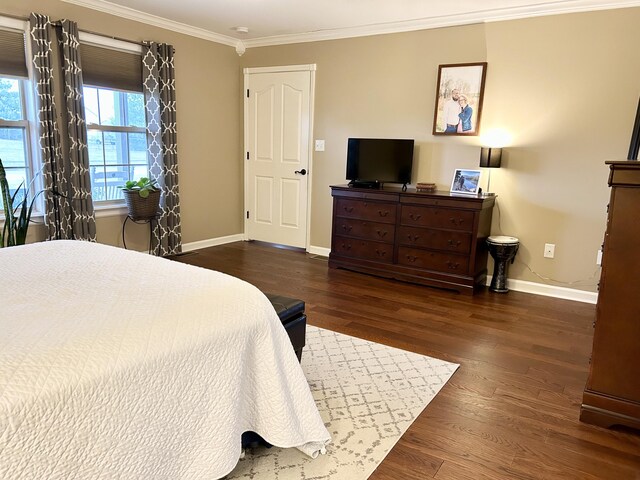 bedroom featuring lofted ceiling, a textured ceiling, and dark hardwood / wood-style flooring