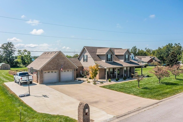 cape cod home with a porch, a garage, and a front yard