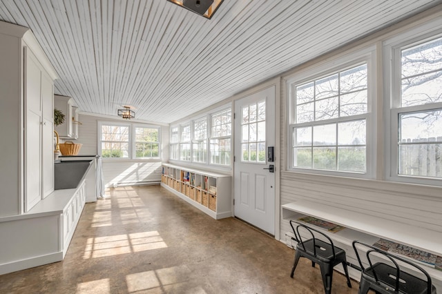 sunroom featuring wooden ceiling