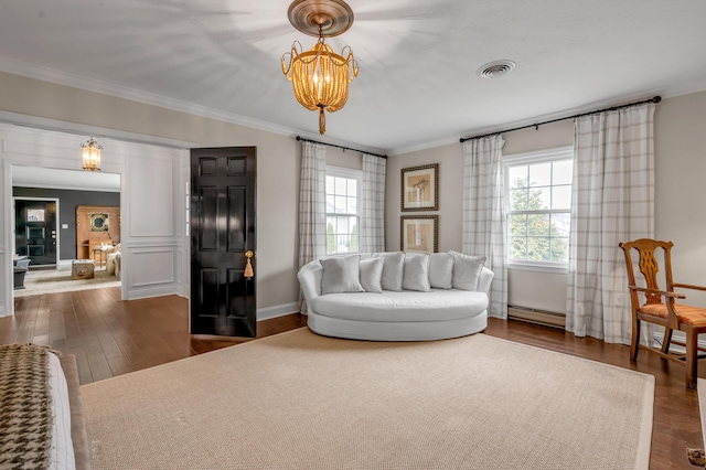 living area with crown molding, visible vents, an inviting chandelier, a baseboard heating unit, and dark wood-type flooring