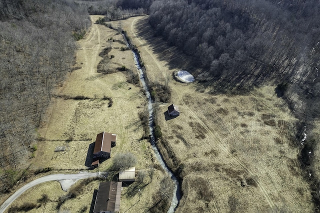 birds eye view of property with a rural view