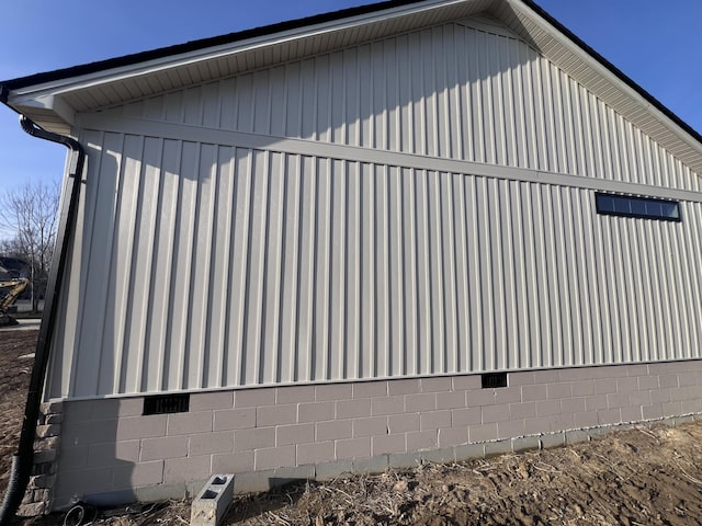 view of side of property with crawl space