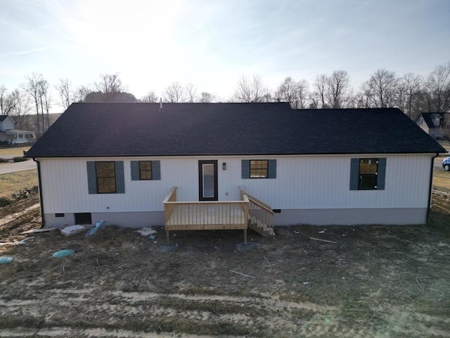 view of front of home with a wooden deck