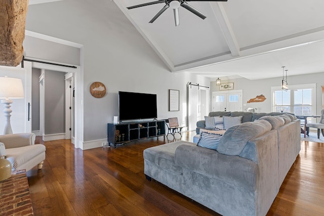 living room featuring high vaulted ceiling, beamed ceiling, hardwood / wood-style flooring, ceiling fan, and a barn door