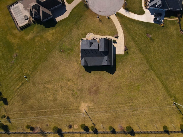 birds eye view of property featuring a rural view