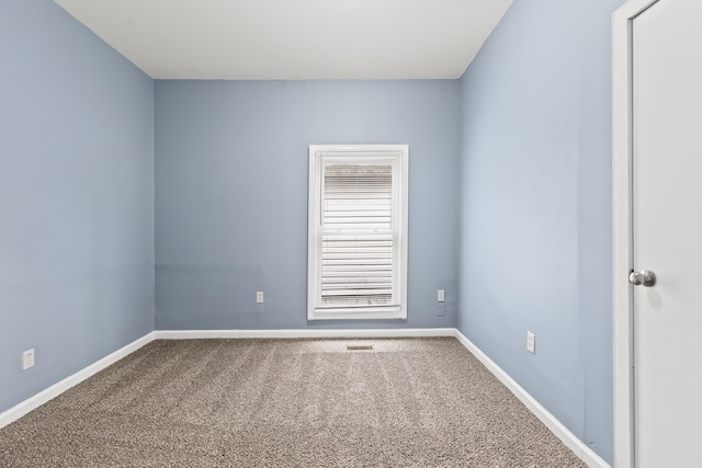 view of carpeted spare room