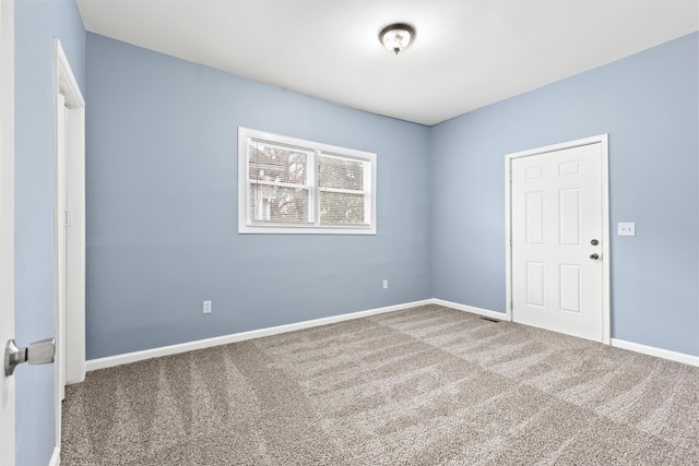 empty room with carpet floors