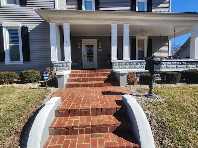 property entrance featuring covered porch