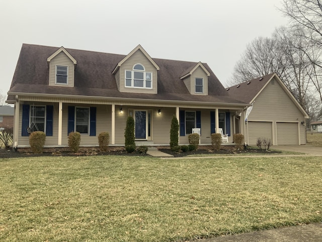 cape cod home featuring a garage, covered porch, and a front lawn