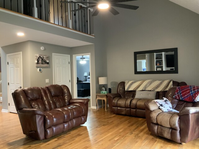 living area with hardwood / wood-style floors