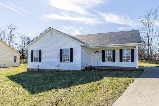 ranch-style house featuring a front lawn