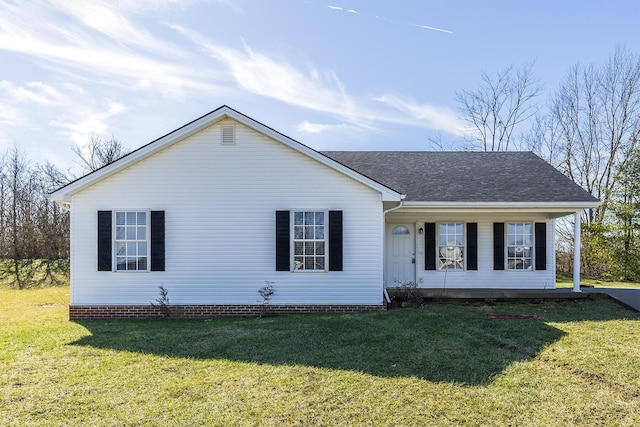 ranch-style home with a front lawn