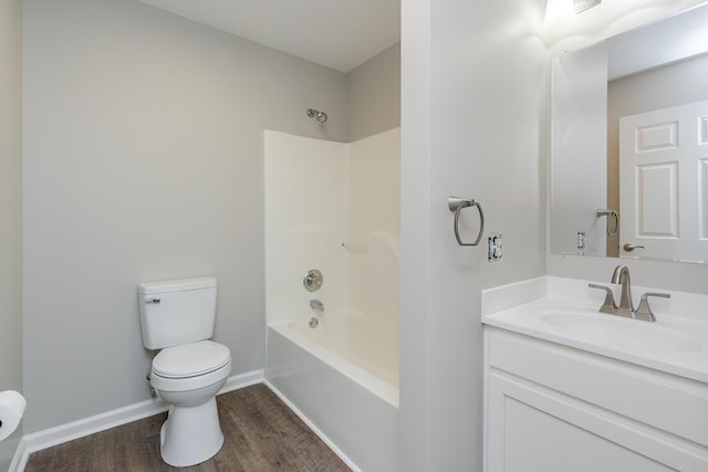 full bathroom with shower / bath combination, vanity, hardwood / wood-style flooring, and toilet