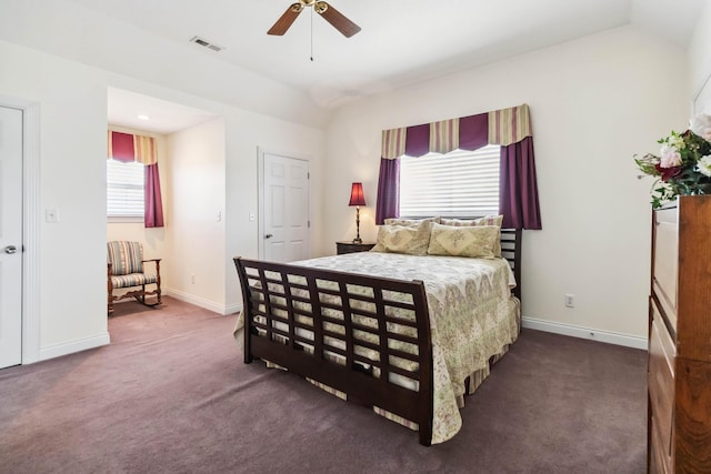 carpeted bedroom featuring ceiling fan and vaulted ceiling