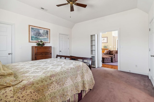 bedroom featuring lofted ceiling, ceiling fan, and carpet