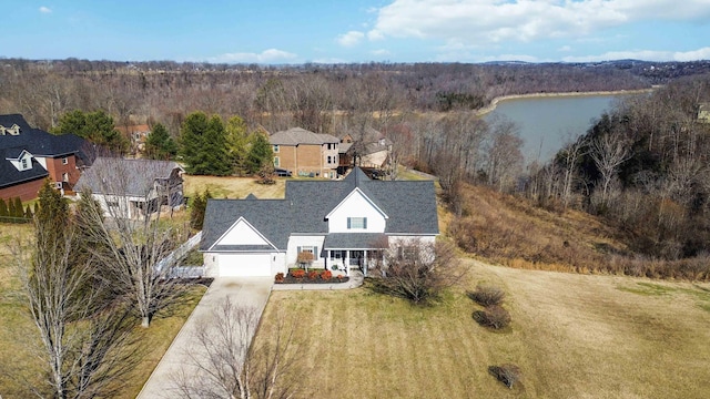 bird's eye view with a water view