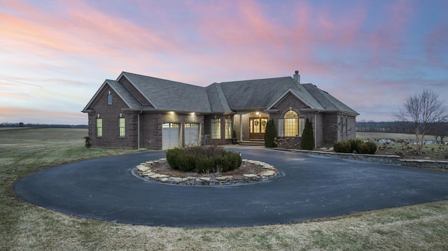 view of front of home featuring a garage