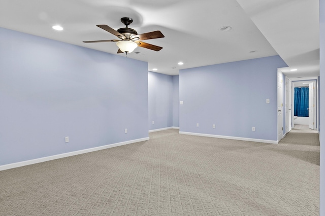 empty room featuring baseboards, ceiling fan, light colored carpet, and recessed lighting