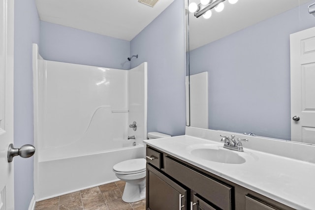 full bathroom featuring toilet, vanity, visible vents, and shower / bathtub combination