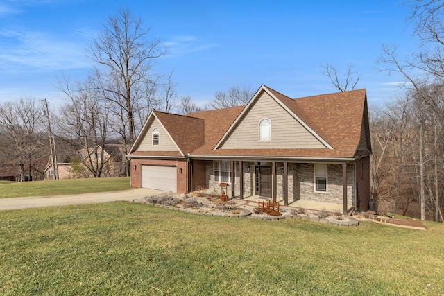 view of front of home featuring a garage, a front yard, and a porch