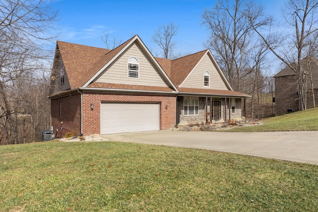 view of front of home featuring a garage, a front yard, covered porch, and cooling unit