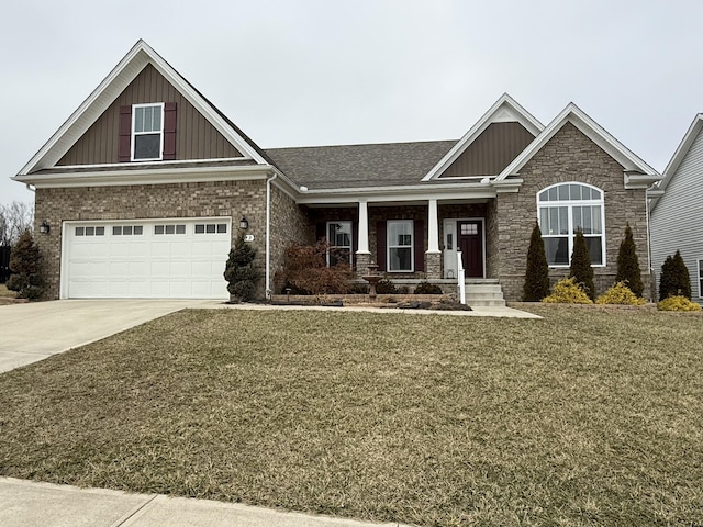 craftsman-style house with a porch, a garage, and a front lawn