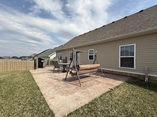 view of patio / terrace featuring fence