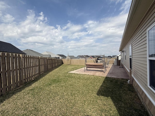 view of yard featuring a fenced backyard and a patio area