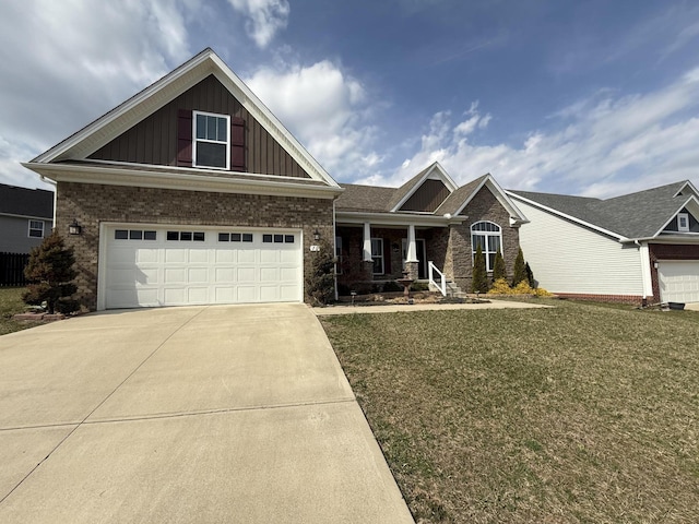 craftsman house with a front lawn, driveway, board and batten siding, a garage, and brick siding