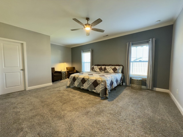 carpeted bedroom featuring crown molding, multiple windows, a ceiling fan, and baseboards