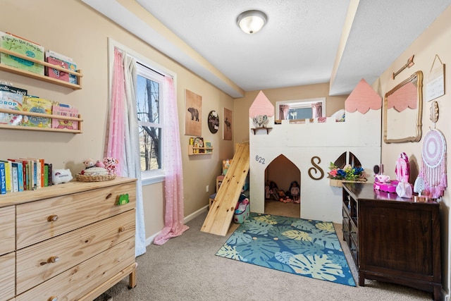 carpeted bedroom featuring a textured ceiling