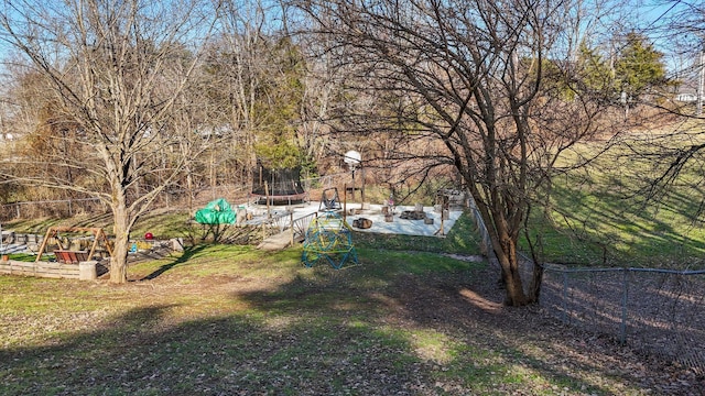 view of yard with a trampoline