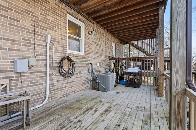 wooden terrace with central air condition unit